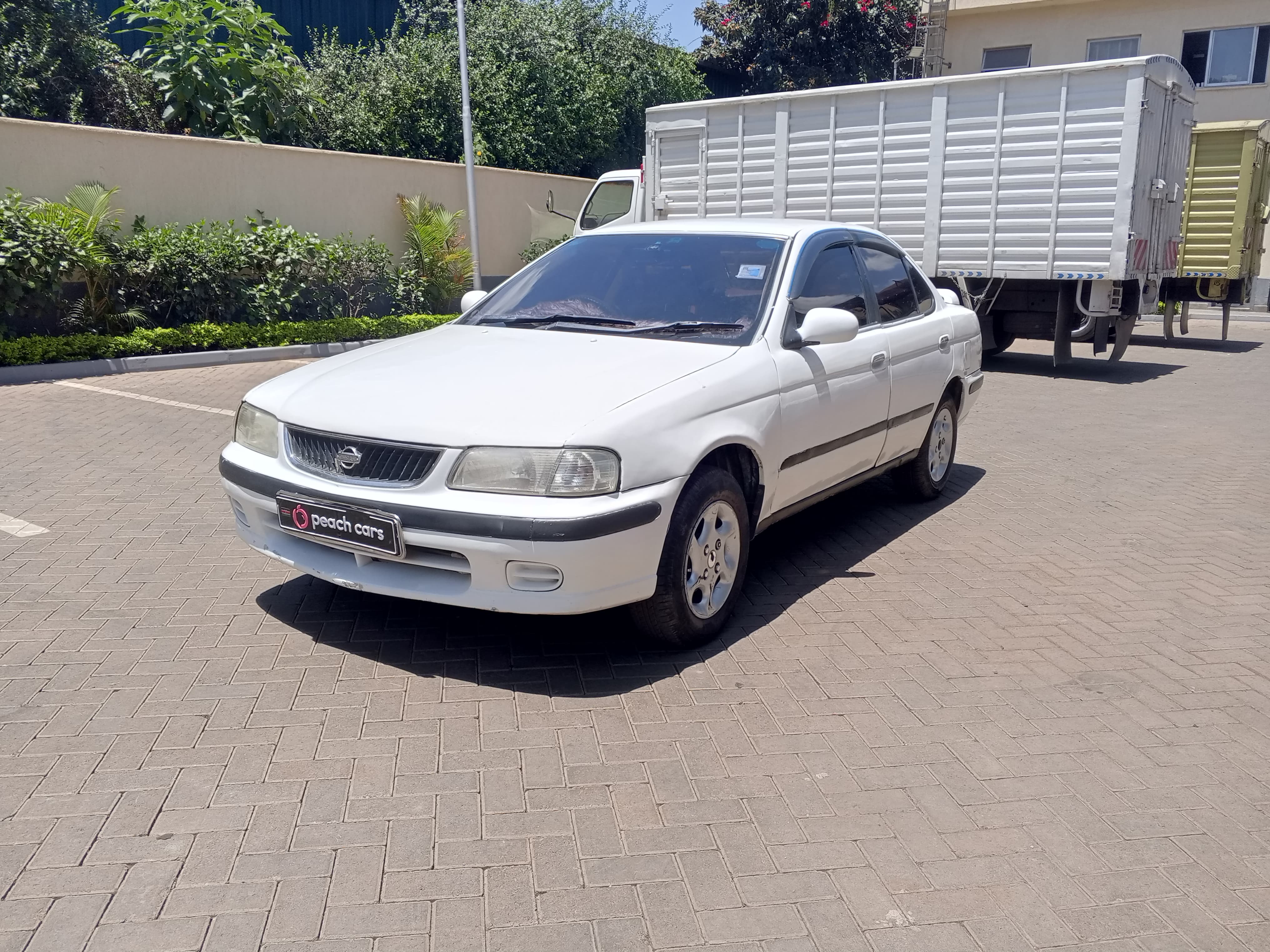 2003 NISSAN sunny - Peach Cars