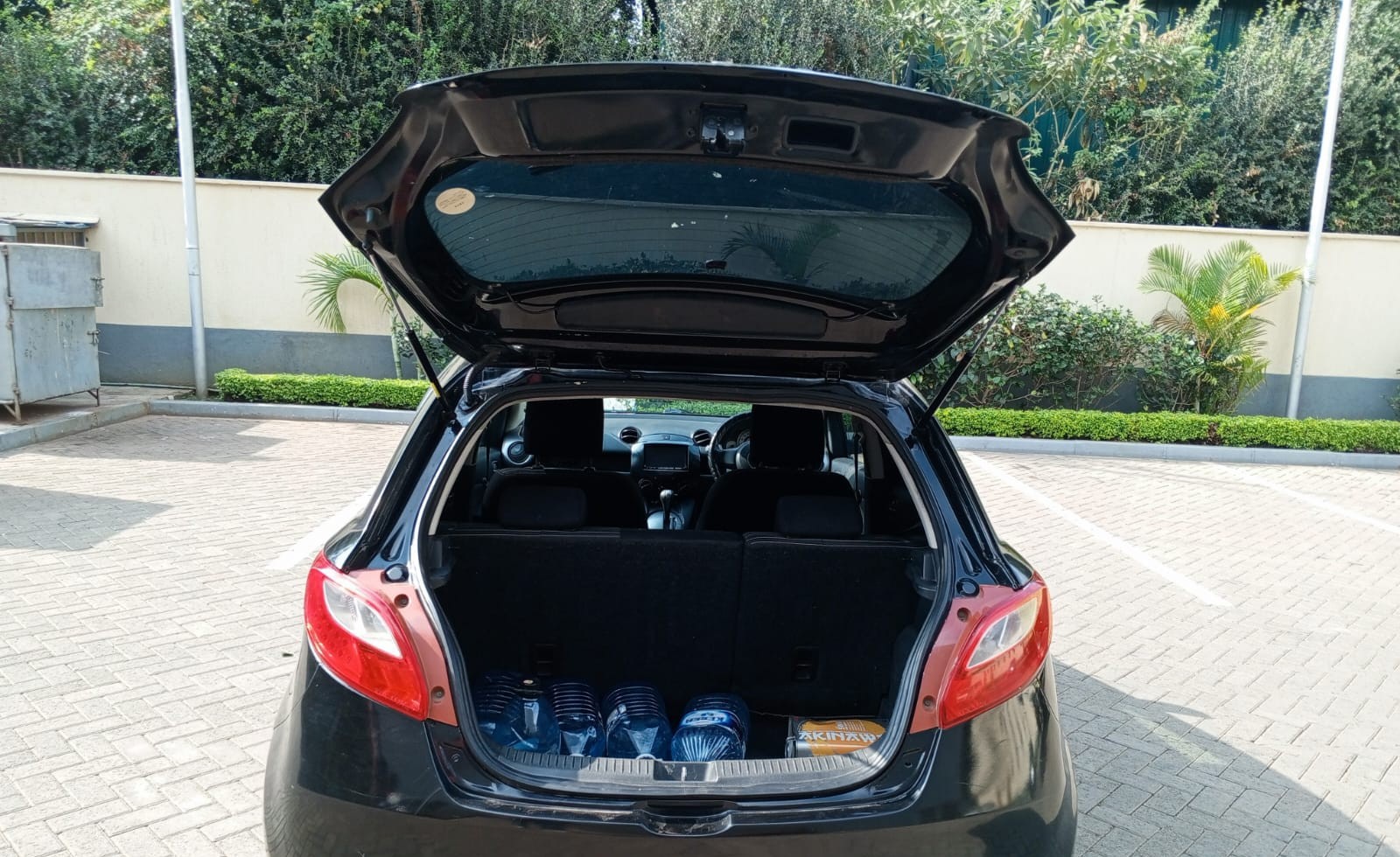 2009 MAZDA Demio - Peach Cars
