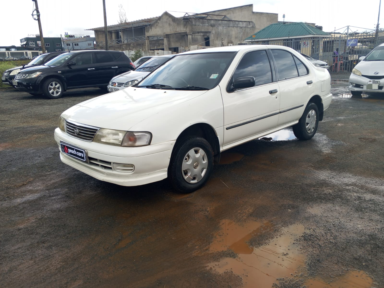 1997 NISSAN sunny - Peach Cars
