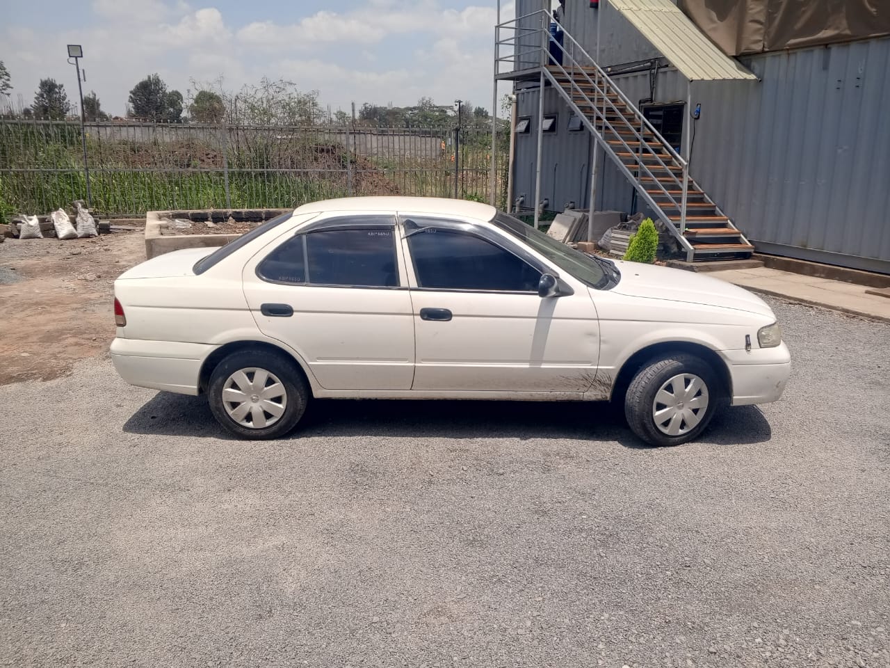 2004 NISSAN sunny - Peach Cars