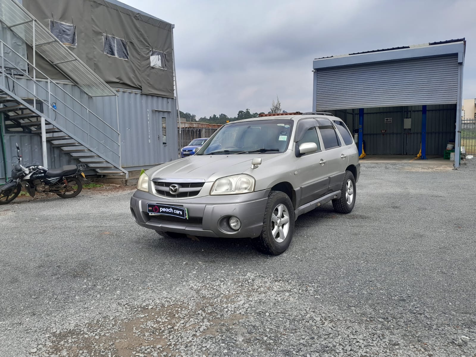 2004 MAZDA Tribute - Peach Cars