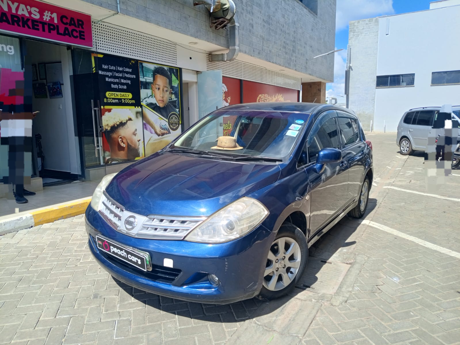 2009 NISSAN Tiida - Peach Cars