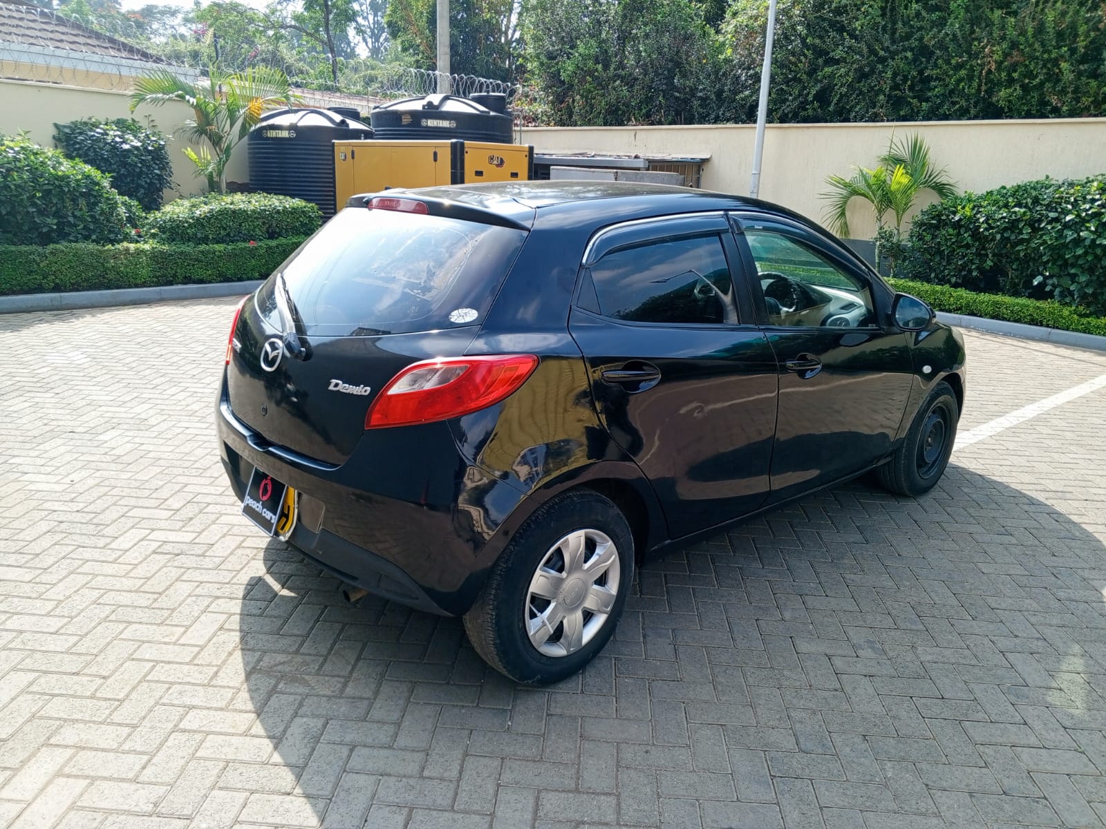 2009 MAZDA Demio - Peach Cars