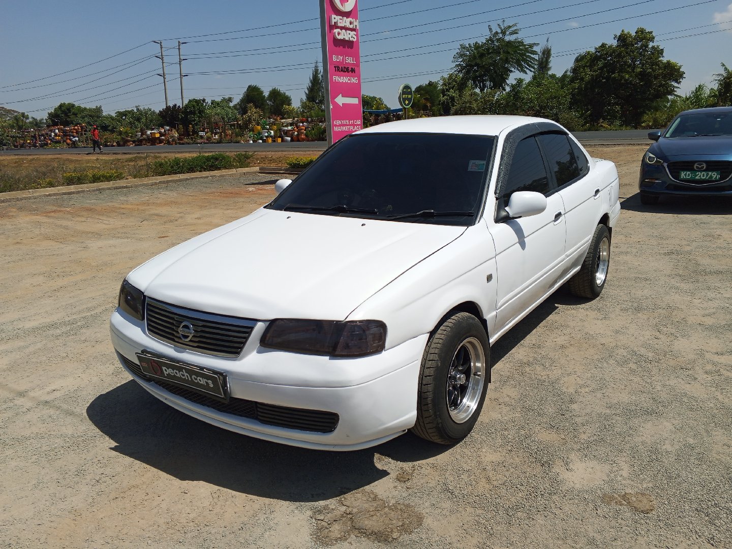 2004 NISSAN sunny - Peach Cars