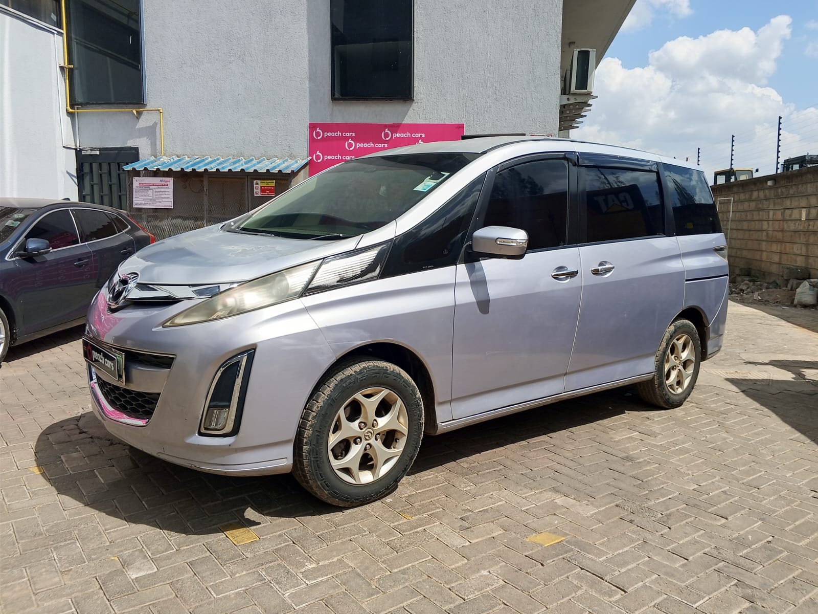 2009 MAZDA Biante - Peach Cars