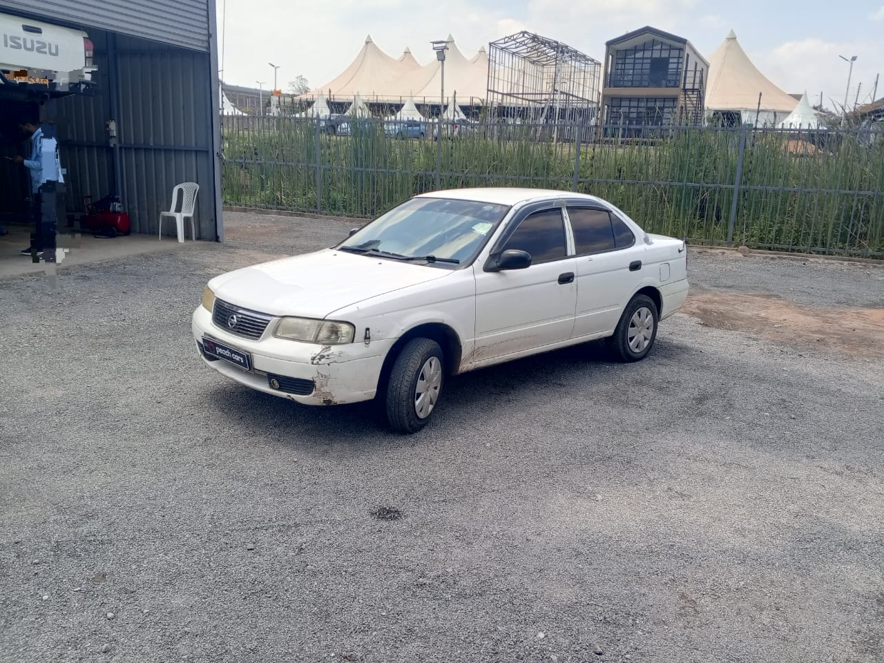 2004 NISSAN sunny - Peach Cars
