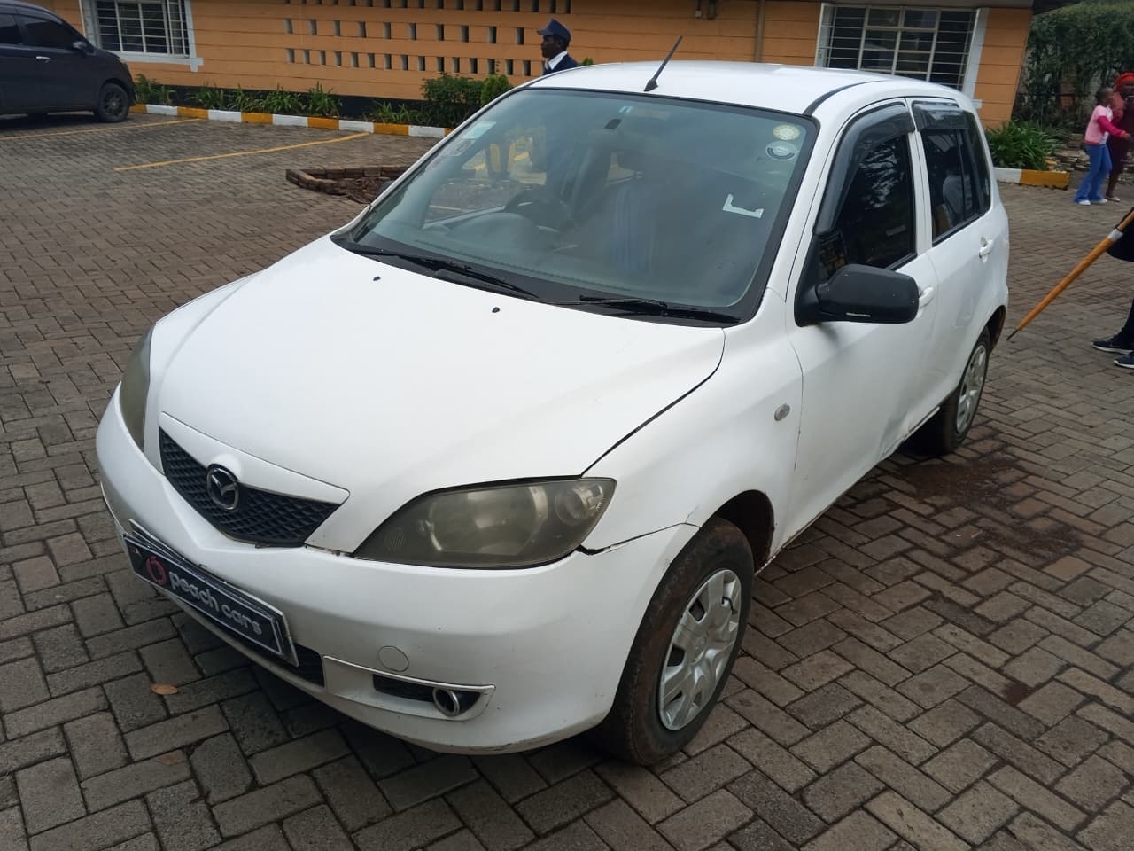 2004 MAZDA Demio - Peach Cars